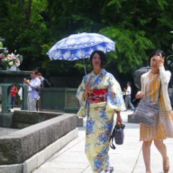 girl wearing yukata with umbrella